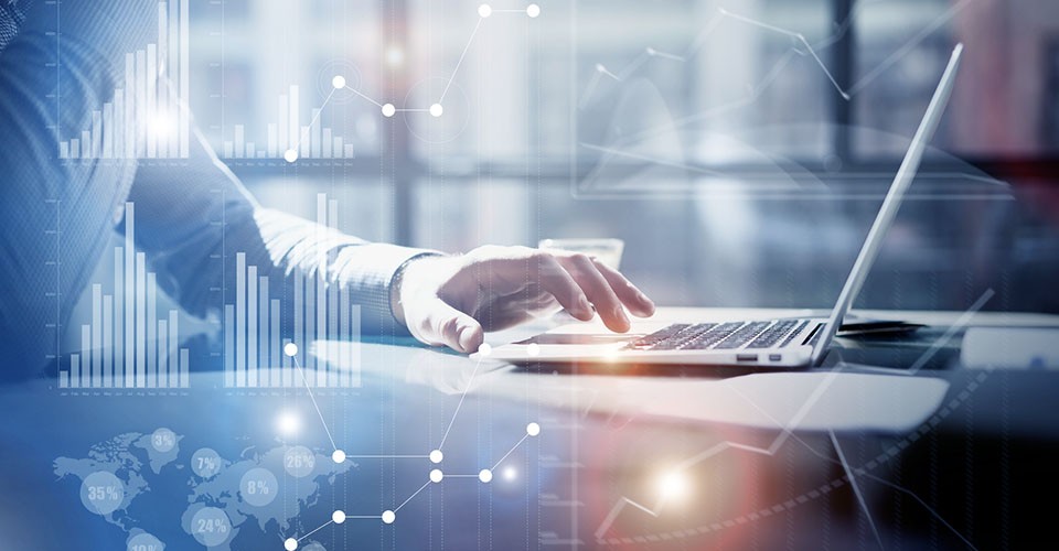 Man working on laptop - Data to knowledge.