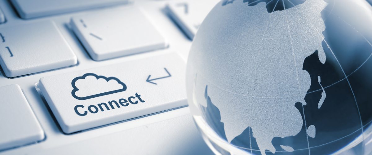Globe over keyboard - Cloud connect.